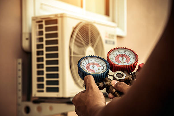 Professional Air Conditioning Service technician working in Garfield, TX
